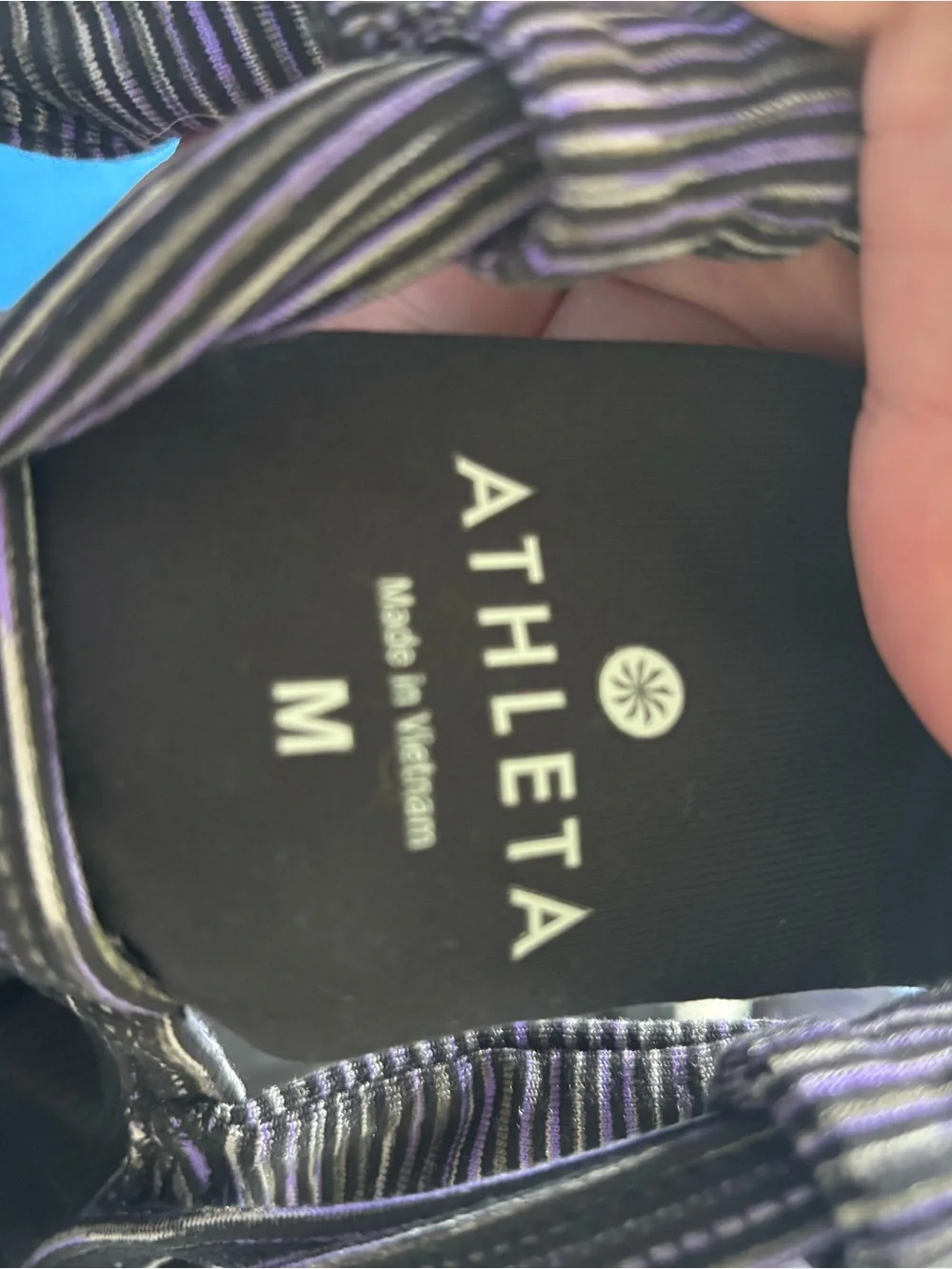Athleta Black Performance Top with Subtle Purple Accent